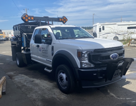 large f-350 truck with flashing lights on the top