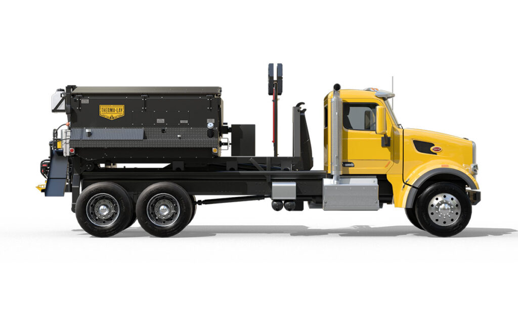 Side view of Thermo-Lay asphalt patching hook-lift unit.